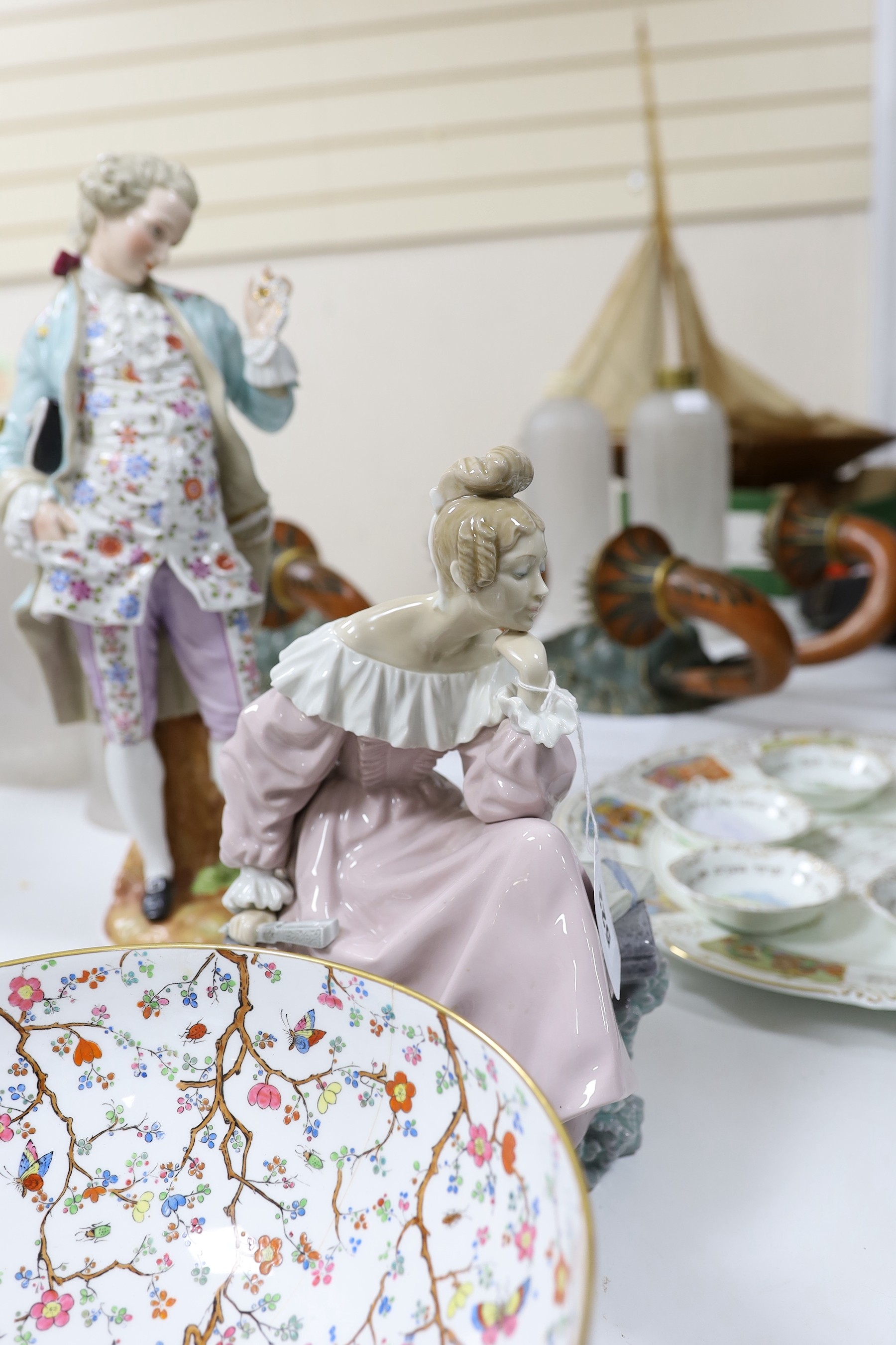 A pair of continental figurines, a Lladro figurine, Royal Doulton 'Diana' figurine, Spode bowl and two plates. Tallest 44cm